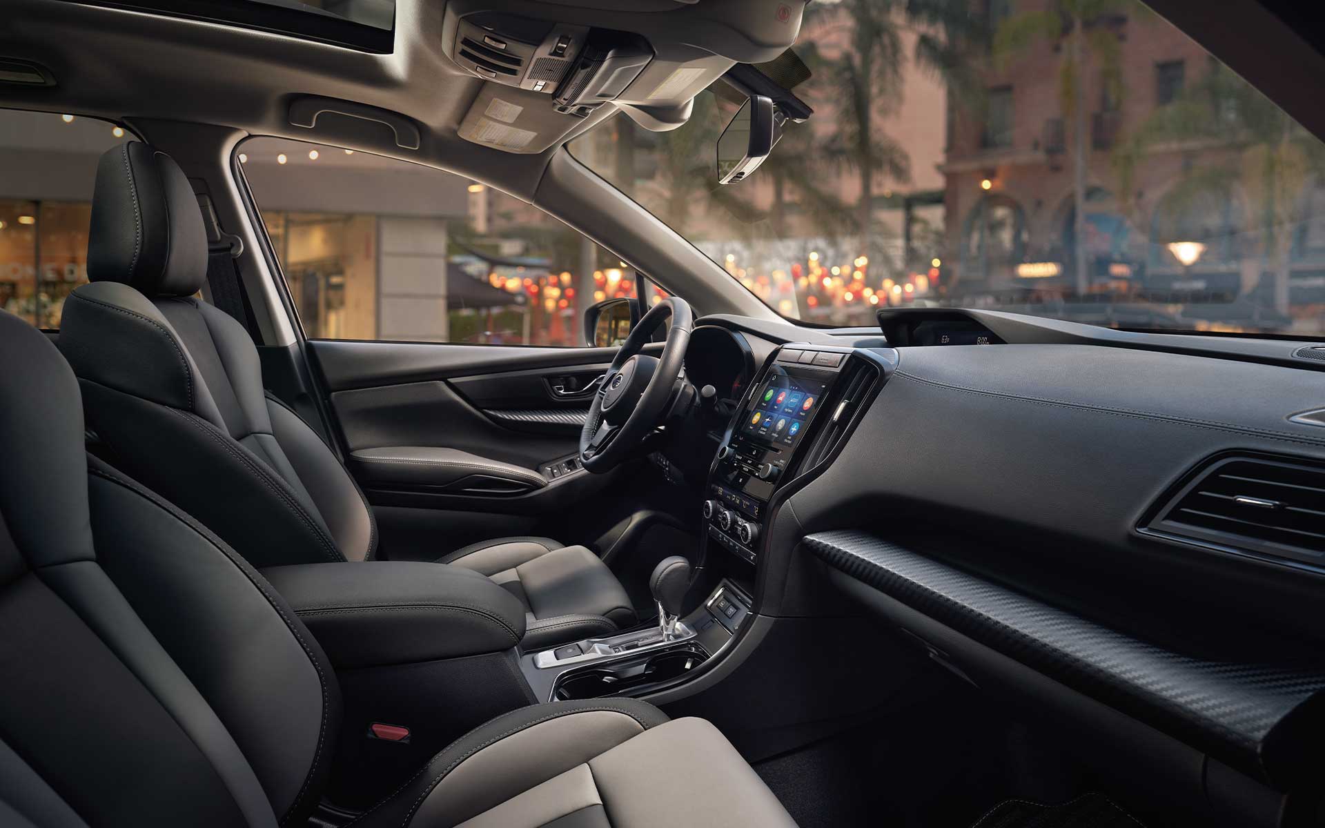 A view of the front seats showing the upgraded interior of the Subaru Ascent Onyx Edition.